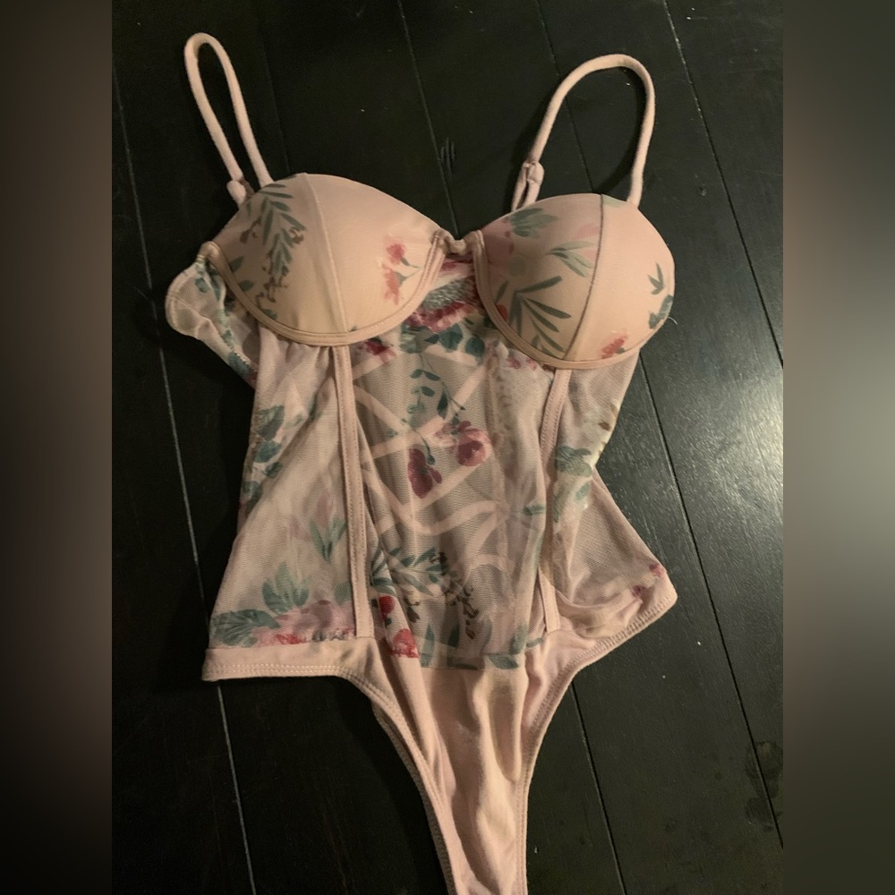 Pink strapped floral bodysuit for woman